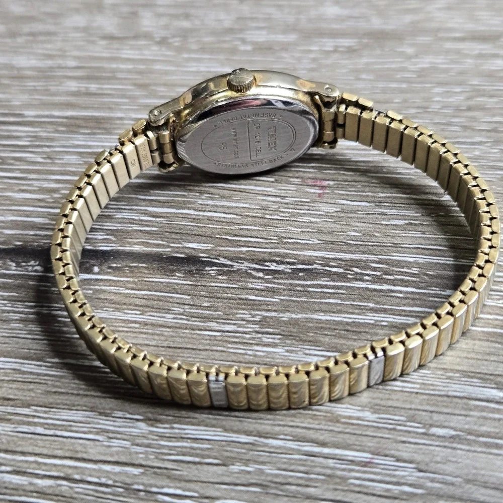 Timex Cavatina Women's Oval Watch Gold Tone Stretch Band Quartz Working 6